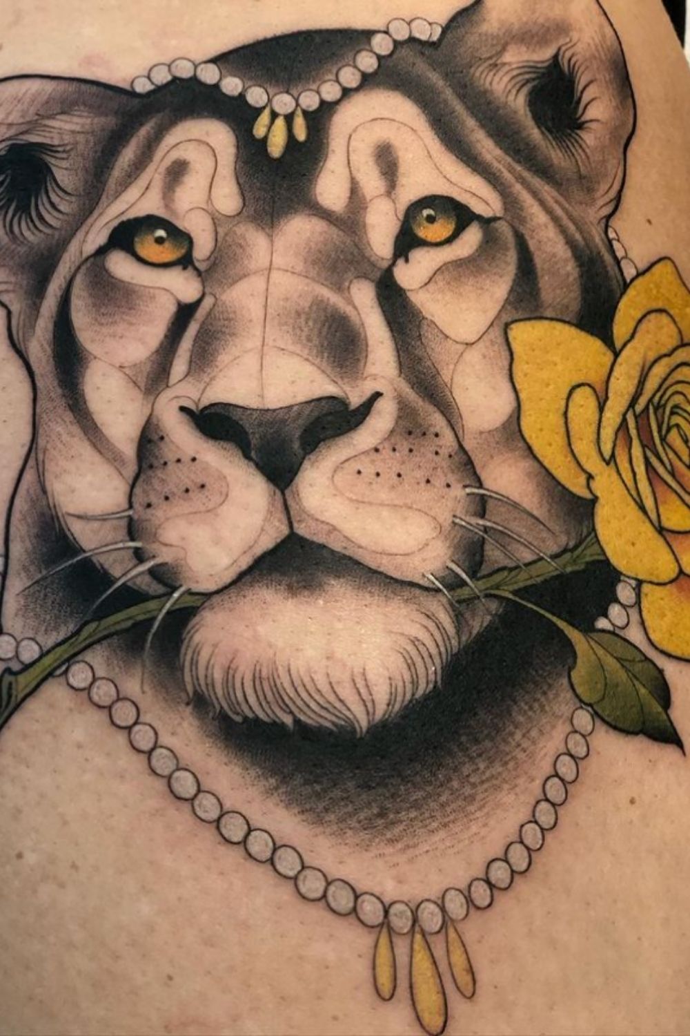 lion tattoo with flowers