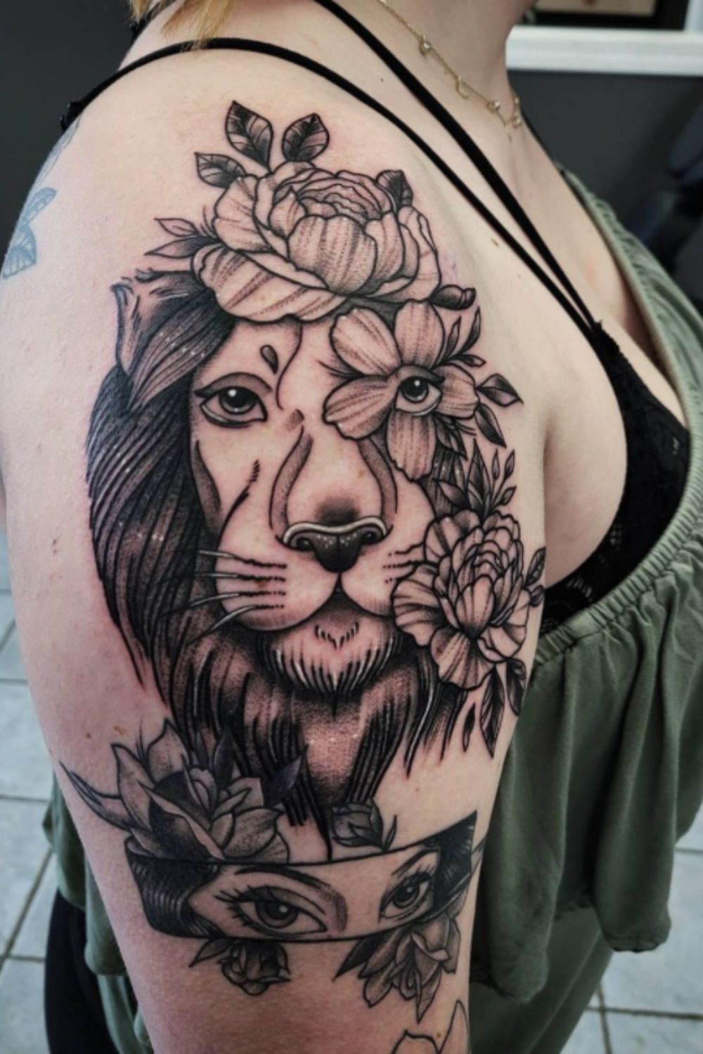 lion tattoo with flowers