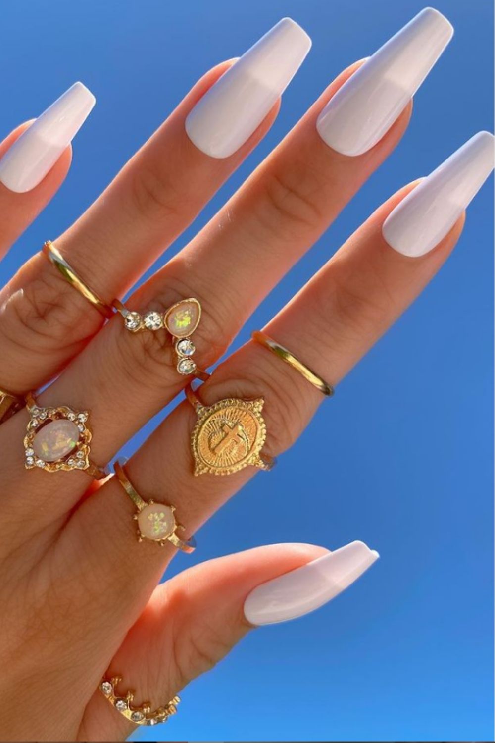 white acrylic nails with design coffin