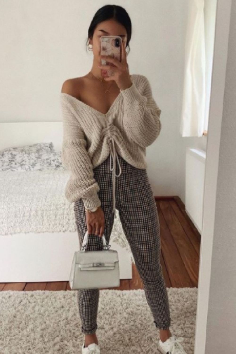 Stylish fall outfit with a sweater