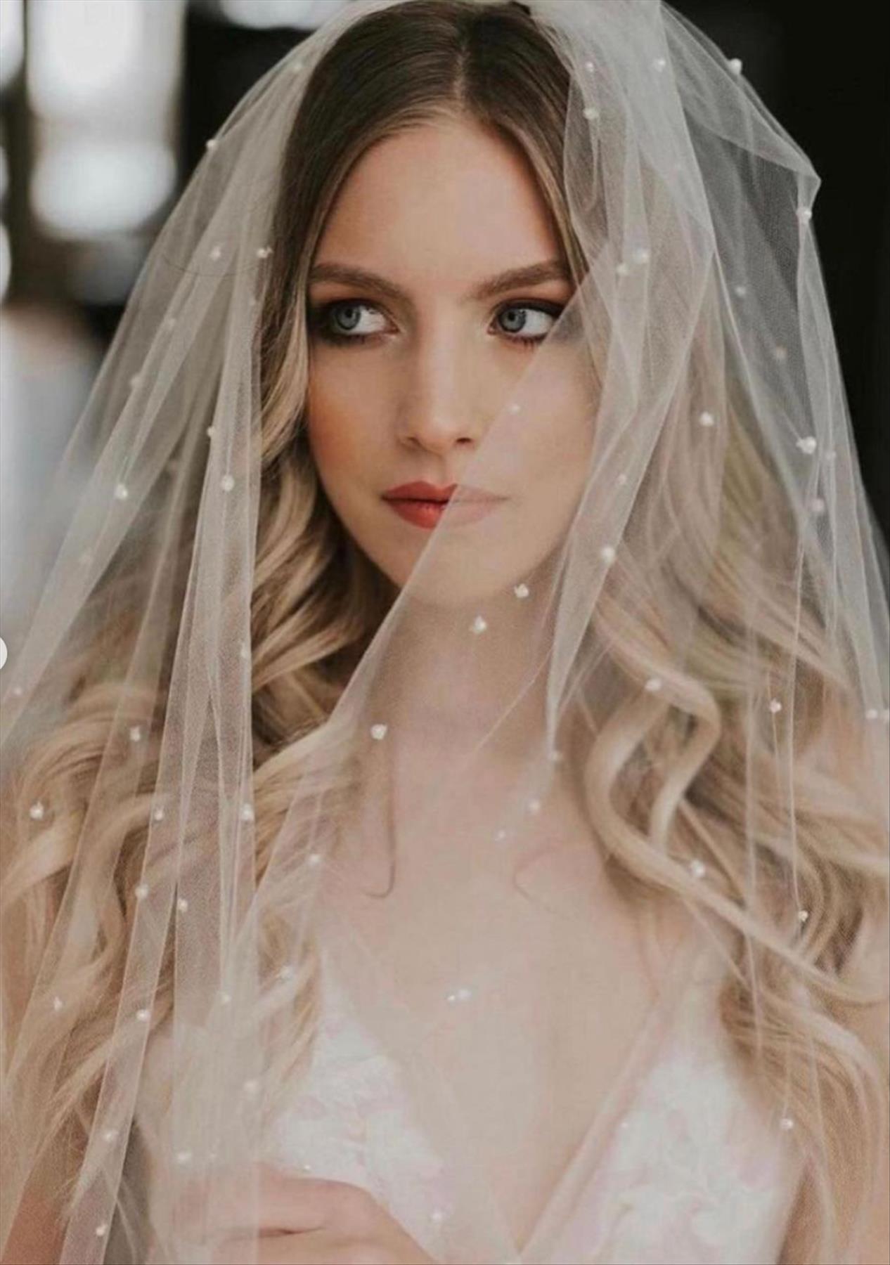 Romantic ways to wear wedding hairstyle with veils